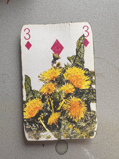 The Best Hand original art playing card by Oli Fowler, three of diamonds hand screen-printed with a cluster of yellow dandelion flowers