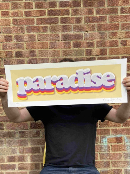 Paradise hand-pulled screenprint by Oli Fowler, bold retro rainbow layered typography on gold