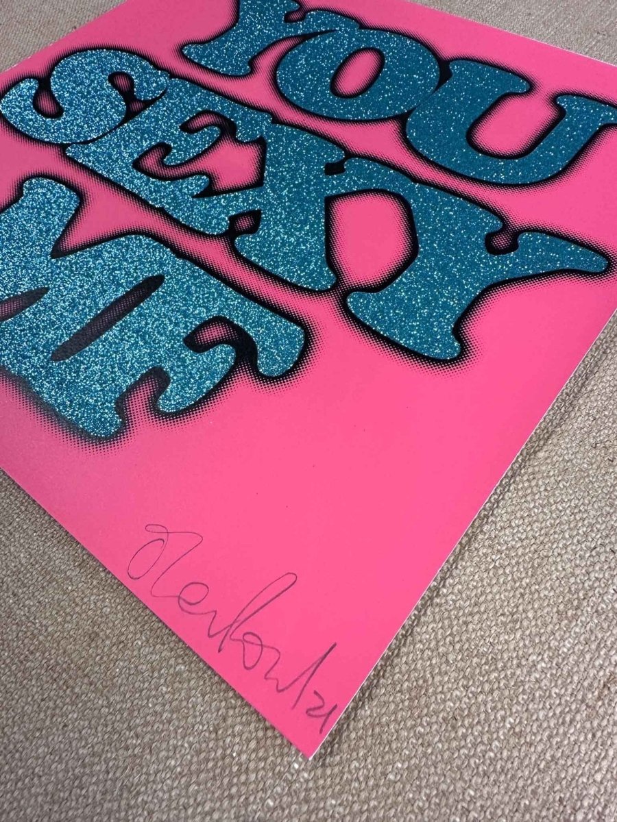 Hand-pulled glitter screenprint, turquoise and black on coral pink, bold 'You Sexy MF' text, edition of 100