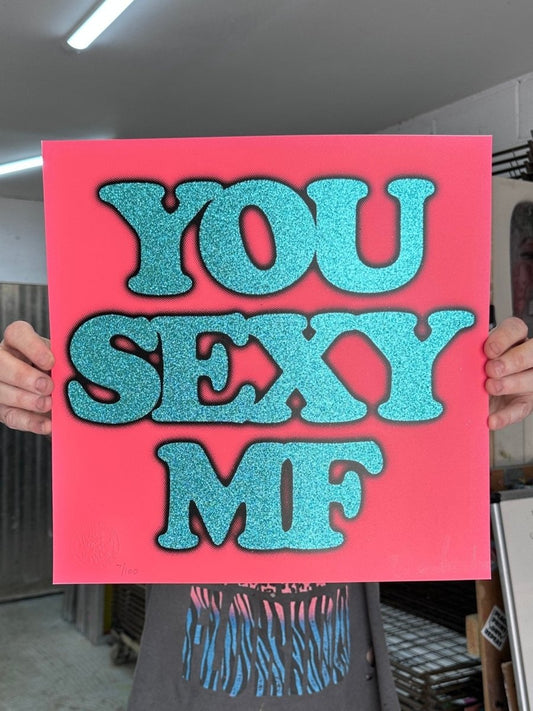 You Sexy MF hand-pulled glitter screenprint by Oli Fowler — teal glitter type on neon pink, limited edition